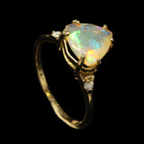 Trillium or Triangle Cut Faceted Ethiopian Opal in an Offset Gold Engagement Ring with Diamond Accents