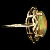 Large Ethiopian Honey Opal displaying both Honeycomb and Straw or Chaff Patterns. Set in a Vintage 1950s London Gold Ring.