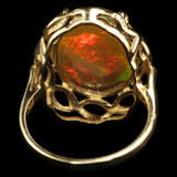 Large Ethiopian Honey Opal displaying both Honeycomb and Straw or Chaff Patterns. Set in a Vintage 1950s London Gold Ring.