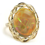 Large Ethiopian Honey Opal displaying both Honeycomb and Straw or Chaff Patterns. Set in a Vintage 1950s London Gold Ring.