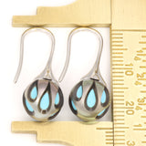 White Gold Galatea Earrings with Carved Tahitian Pearls over Turquoise