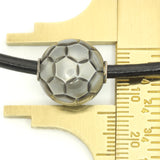 Galatea Tahitian Pearl Carved in a Soccer Ball Style, on a Black Leather Thong Necklace with Silver Clasp.