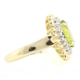 Peridot With a Halo of Diamonds and Golden Petals in a Sunflower Setting. Gold Ring.