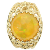 Large Ethiopian Honey Opal Cabochon with strong Orange and Green play-of-color in Gold Ring with Fancy Gallery Bezel