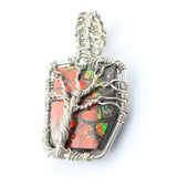 Ammolite Fossil set in a Silver Wire-Wrapped Pendant Under a Branching Tree