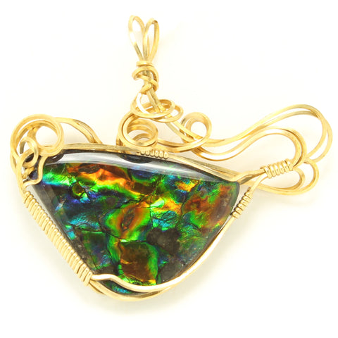 Full-Spectrum Ammolite Fossil Triplet in Wire-Wrapped Pendant with Gold-Filled Wire.