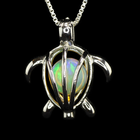Small Ethiopian Opal Sphere in a Silver Turtle Cage Pendant on a Box Chain Necklace.