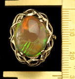 Large Ethiopian Honey Opal displaying both Honeycomb and Straw or Chaff Patterns. Set in a Vintage 1950s London Gold Ring.