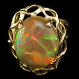 Large Ethiopian Honey Opal displaying both Honeycomb and Straw or Chaff Patterns. Set in a Vintage 1950s London Gold Ring.