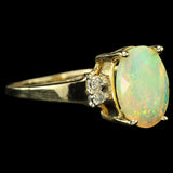 Faceted Pinfire Ethiopian Opal with Diamond Accents.  Gold Ring