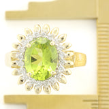 Peridot With a Halo of Diamonds and Golden Petals in a Sunflower Setting. Gold Ring.