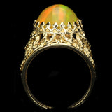 Large Ethiopian Honey Opal Cabochon with strong Orange and Green play-of-color in Gold Ring with Fancy Gallery Bezel