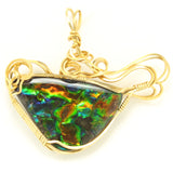 Full-Spectrum Ammolite Fossil Triplet in Wire-Wrapped Pendant with Gold-Filled Wire.