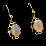 Faceted, Full-Spectrum Ethiopian Opals in Gold Earrings with Leverback Closure